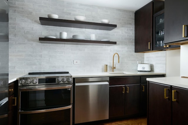 kitchen with stainless steel appliances, light countertops, and open shelves