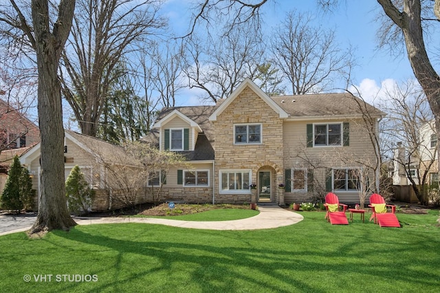 630 Juniper Rd, Glenview, IL 60025 - back of property with stone siding and a yard