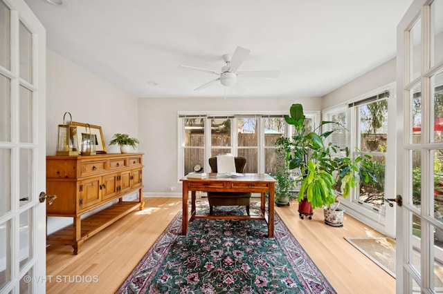 630 Juniper Rd, Glenview, IL 60025 - home office with wood finished floors, french doors, ceiling fan, and baseboards