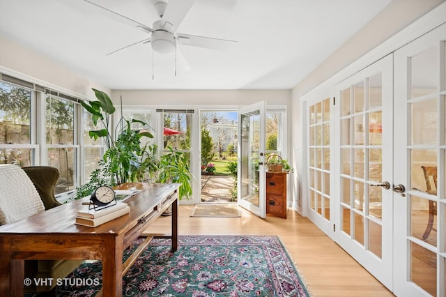 630 Juniper Rd, Glenview, IL 60025 - sunroom featuring french doors, wood finished floors, and plenty of natural light