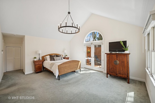 630 Juniper Rd, Glenview, IL 60025 - carpeted bedroom with french doors, access to exterior, high vaulted ceiling, a chandelier, and baseboards