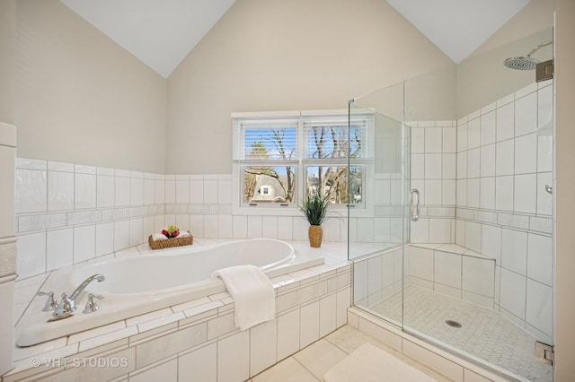 630 Juniper Rd, Glenview, IL 60025 - full bath featuring lofted ceiling, a stall shower, and a garden tub
