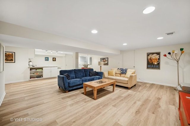 630 Juniper Rd, Glenview, IL 60025 - living area with light wood-type flooring, baseboards, recessed lighting, and track lighting
