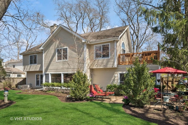 630 Juniper Rd, Glenview, IL 60025 - rear view of property featuring a chimney, cooling unit, and a lawn