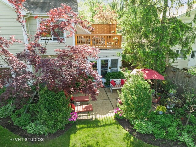 630 Juniper Rd, Glenview, IL 60025 - fenced yard featuring a balcony and a patio area