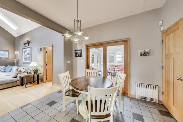 35 Keystone Ave, River Forest, IL 60305 - dining area featuring radiator heating unit, light tile patterned flooring, vaulted ceiling, and baseboards