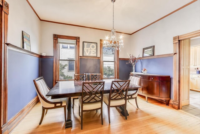 35 Keystone Ave, River Forest, IL 60305 - dining room with a chandelier, wood-type flooring, and crown molding