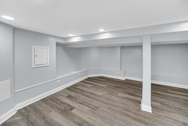 7316 S Woodlawn Ave, Chicago, IL 60619 - finished below grade area featuring wood finished floors, baseboards, and recessed lighting