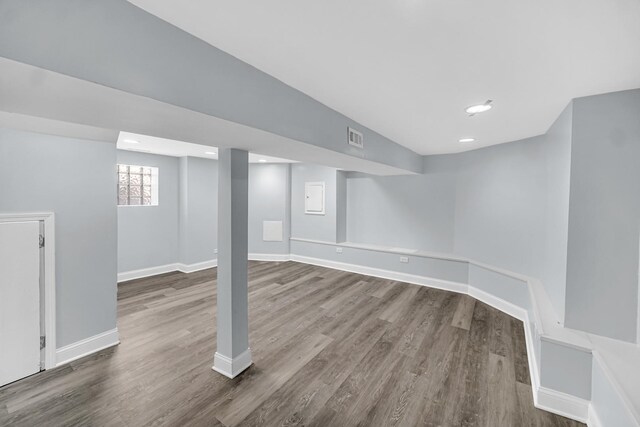 7316 S Woodlawn Ave, Chicago, IL 60619 - below grade area with dark wood-style flooring, baseboards, and recessed lighting