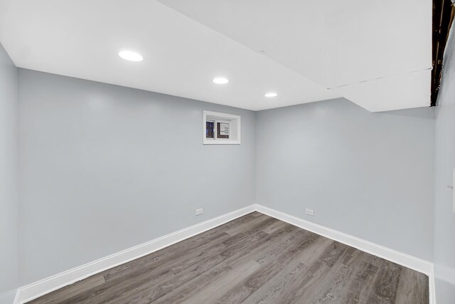 7316 S Woodlawn Ave, Chicago, IL 60619 - finished below grade area featuring dark wood-style flooring, baseboards, and recessed lighting