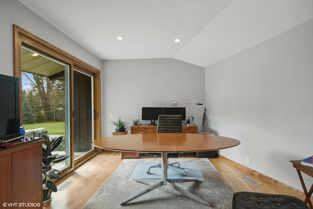 office space with light wood-style flooring, recessed lighting, and lofted ceiling