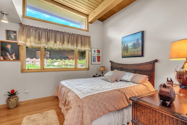 347 Park Dr, Palatine, IL 60067 - bedroom with wood finished floors, baseboards, and wooden ceiling with exposed beams