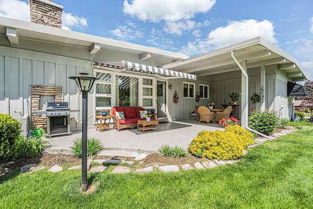 347 Park Dr, Palatine, IL 60067 - back of house featuring board and batten siding, outdoor lounge area, a patio, and a chimney