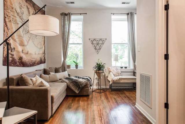 1335 N Greenview Ave Unit 1F, Chicago, IL 60642 - living room featuring wood-type flooring, plenty of natural light, and baseboards