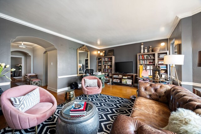 5000 S Cornell Ave Unit 21B, Chicago, IL 60615 - living area with wood finished floors, arched walkways, ornamental molding, and baseboards