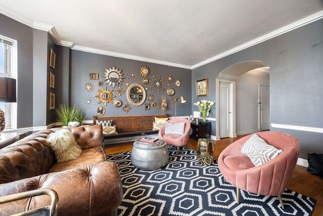 5000 S Cornell Ave Unit 21B, Chicago, IL 60615 - living area featuring arched walkways, ornamental molding, wood finished floors, and baseboards
