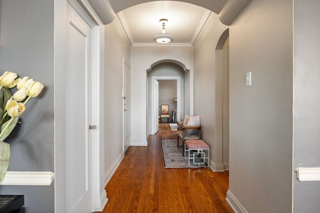 5000 S Cornell Ave Unit 21B, Chicago, IL 60615 - corridor with arched walkways, ornamental molding, wood finished floors, and baseboards