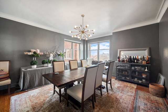 5000 S Cornell Ave Unit 21B, Chicago, IL 60615 - dining room with a chandelier, crown molding, and wood finished floors