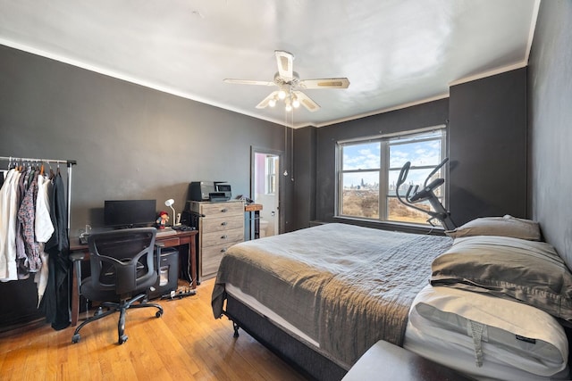 5000 S Cornell Ave Unit 21B, Chicago, IL 60615 - bedroom featuring wood finished floors, an office area, a ceiling fan, and crown molding