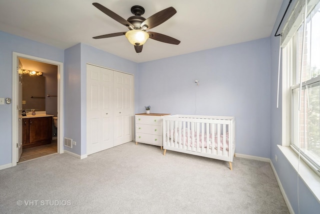 1098 N Claremont Dr Unit 1, Palatine, IL 60074 - unfurnished bedroom with carpet flooring, a closet, baseboards, and ceiling fan