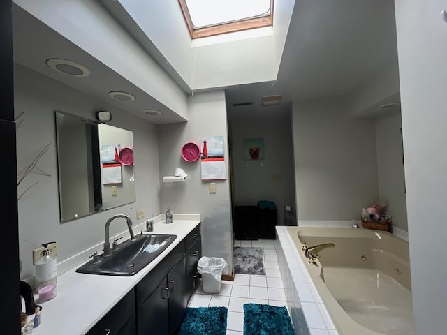 8734 W 99th St, Palos Hills, IL 60465 - full bathroom with tile patterned flooring, a skylight, a whirlpool tub, and vanity