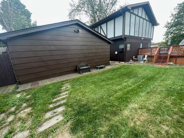 8734 W 99th St, Palos Hills, IL 60465 - view of green lawn featuring a wooden deck and central air condition unit