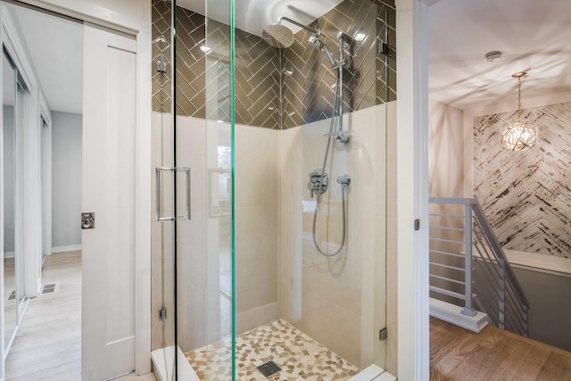 1063 W Busse Hwy, Park Ridge, IL 60068 - bathroom with a stall shower and wood finished floors