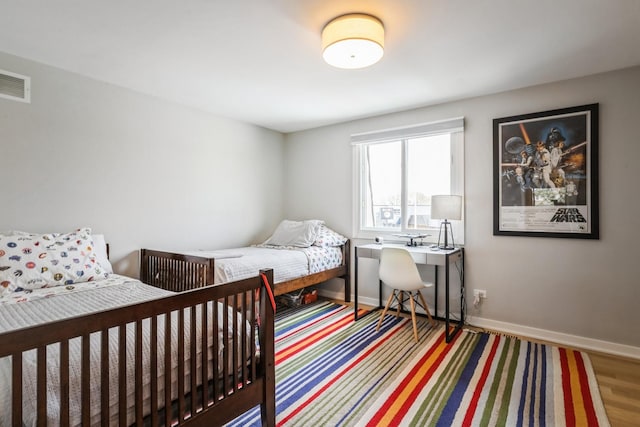 1063 W Busse Hwy, Park Ridge, IL 60068 - bedroom with wood finished floors and baseboards