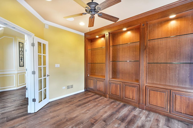 empty room featuring dark wood-style flooring, ceiling fan, ornamental molding, baseboards, and recessed lighting