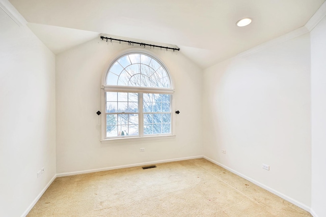 unfurnished room featuring vaulted ceiling, carpet, baseboards, and recessed lighting