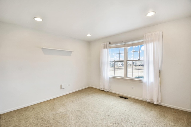 unfurnished room with carpet, baseboards, and recessed lighting