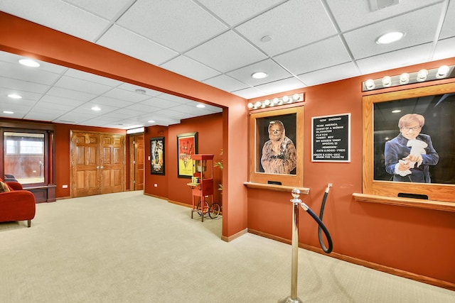 reception area with a drop ceiling and recessed lighting