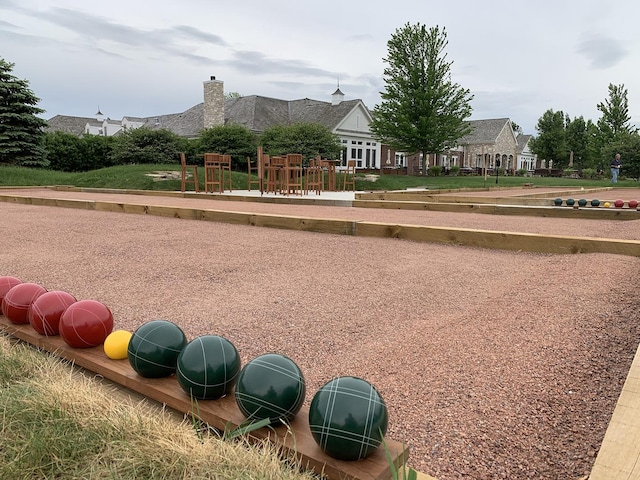 view of property's community featuring a bocce ball area