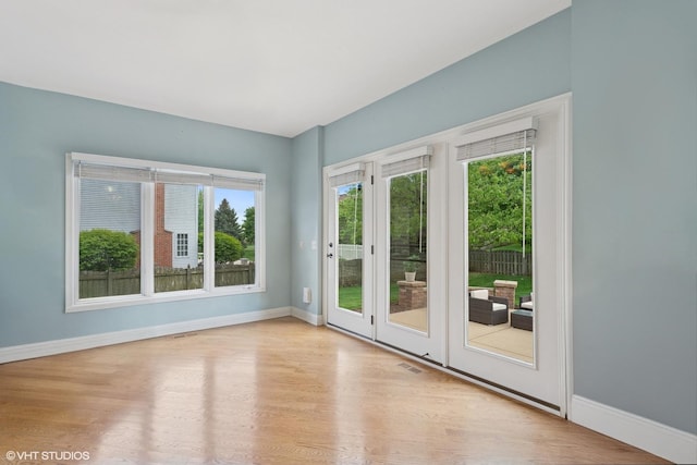 25738 W Sunnymere Dr, Plainfield, IL 60585 - spare room featuring baseboards and wood finished floors