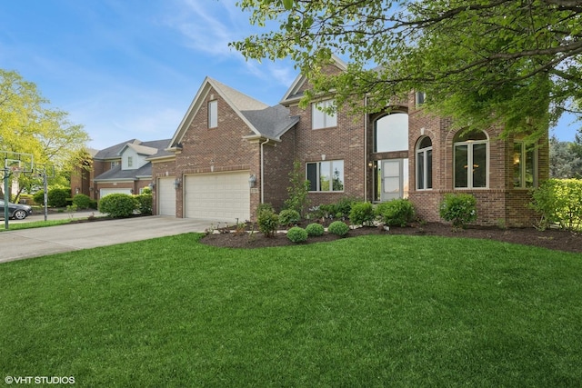25738 W Sunnymere Dr, Plainfield, IL 60585 - view of front facade featuring brick siding, a front yard, driveway, and an attached garage