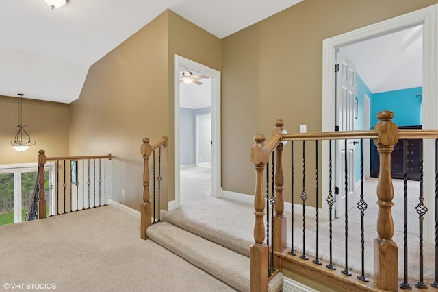 25738 W Sunnymere Dr, Plainfield, IL 60585 - staircase with carpet, vaulted ceiling, baseboards, and ceiling fan