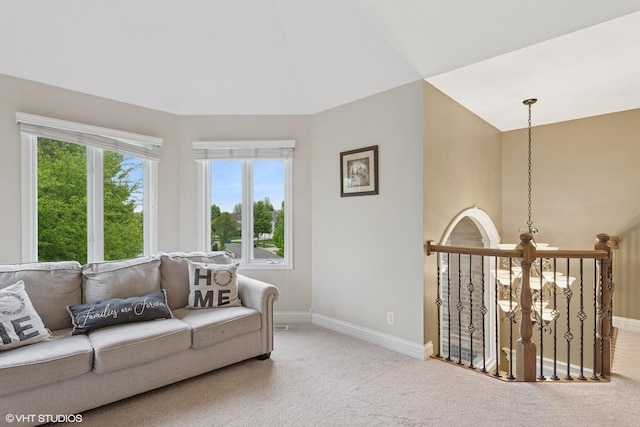 25738 W Sunnymere Dr, Plainfield, IL 60585 - carpeted living area with baseboards and high vaulted ceiling