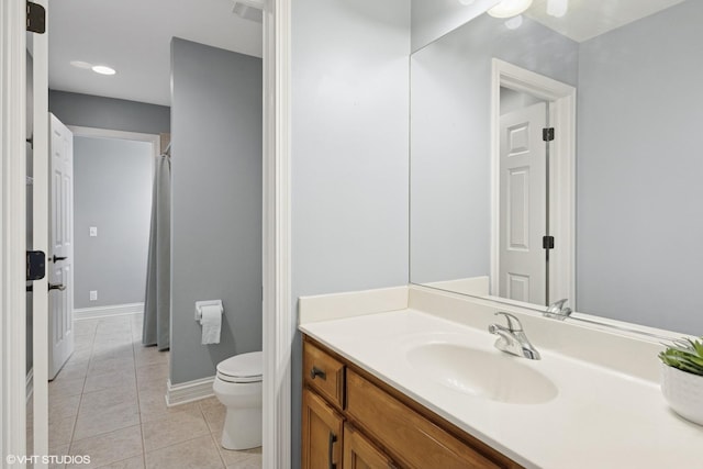 25738 W Sunnymere Dr, Plainfield, IL 60585 - full bathroom featuring toilet, vanity, tile patterned floors, baseboards, and curtained shower