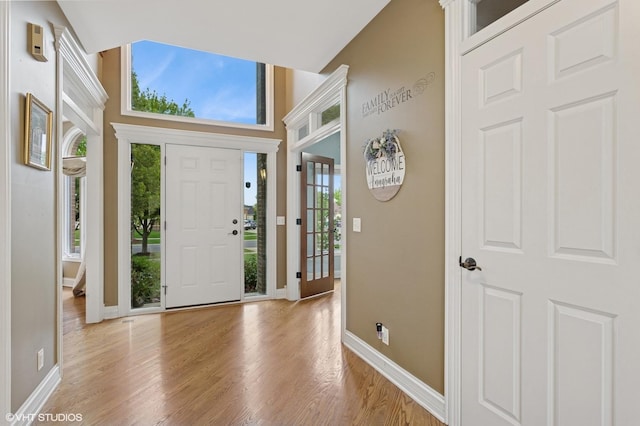25738 W Sunnymere Dr, Plainfield, IL 60585 - foyer featuring light wood finished floors and baseboards