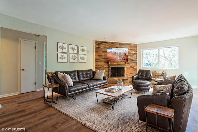 401 W Webster Ave Unit 509, Chicago, IL 60614 - living area featuring dark wood finished floors, a fireplace, and baseboards