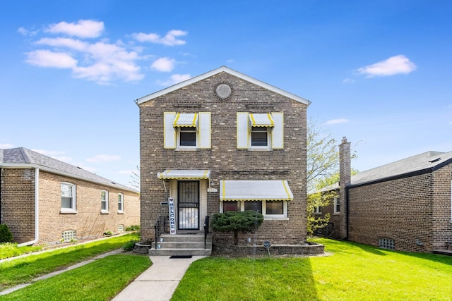 9821 S University Ave, Chicago, IL 60628 - traditional-style home featuring brick siding and a front yard