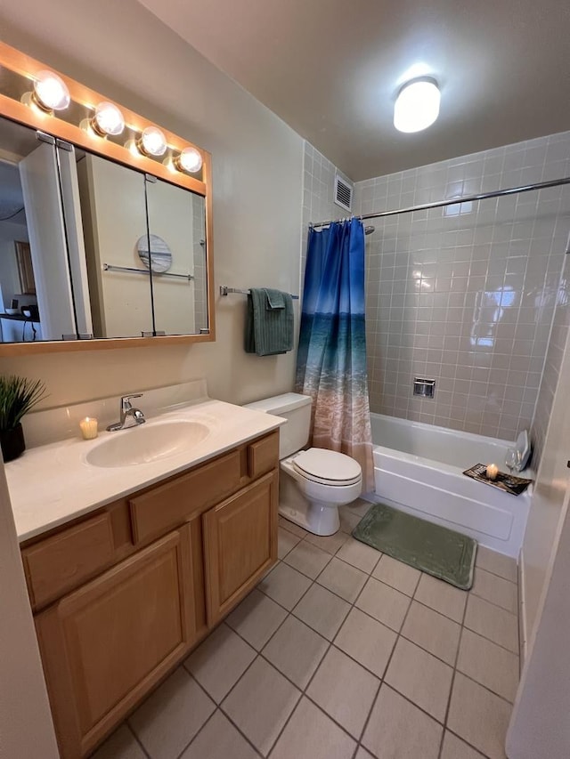 6700 S S Shore Dr Unit 19K, Chicago, IL 60649 - bathroom featuring tile patterned floors, toilet, vanity, and shower / tub combo