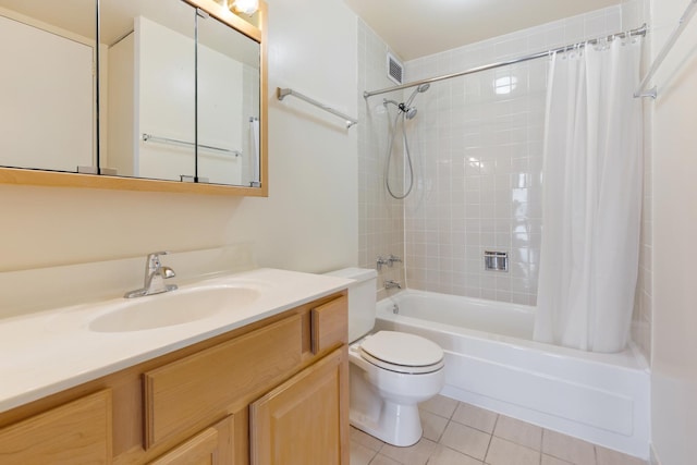 6700 S S Shore Dr Unit 19K, Chicago, IL 60649 - full bathroom featuring toilet, shower / tub combo with curtain, tile patterned flooring, and vanity