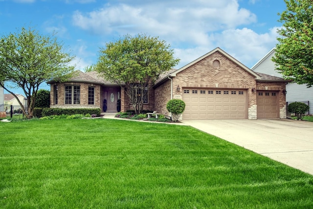 25451 Regent Blvd, Shorewood, IL 60404 - ranch-style home featuring brick siding, a garage, and driveway