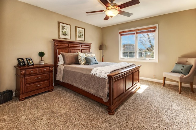 25451 Regent Blvd, Shorewood, IL 60404 - bedroom with light carpet, baseboards, and ceiling fan