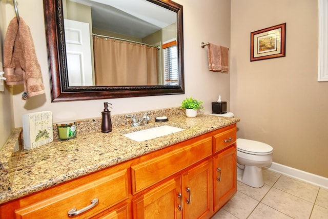 25451 Regent Blvd, Shorewood, IL 60404 - bathroom featuring vanity, tile patterned flooring, toilet, and baseboards