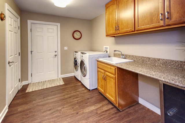25451 Regent Blvd, Shorewood, IL 60404 - laundry room with dark wood-style floors, washer and dryer, baseboards, and cabinet space