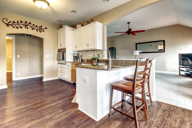 25451 Regent Blvd, Shorewood, IL 60404 - kitchen featuring a sink, appliances with stainless steel finishes, ceiling fan, a peninsula, and white cabinets