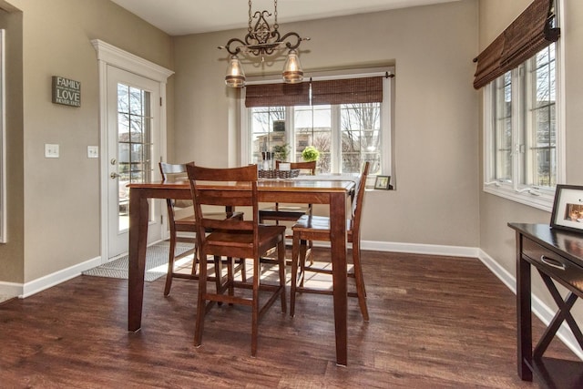 25451 Regent Blvd, Shorewood, IL 60404 - dining area featuring dark wood finished floors and baseboards