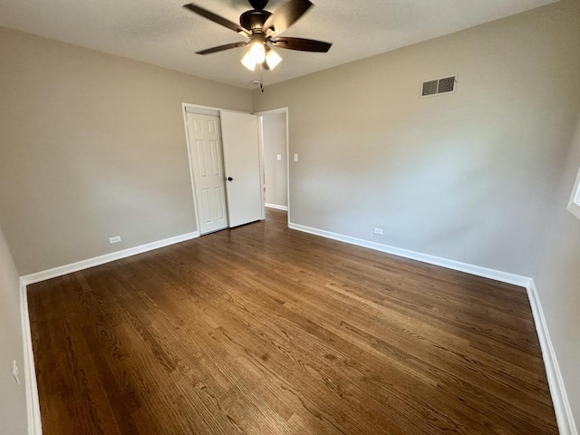 2122 Mandel Ave, Westchester, IL 60154 - empty room featuring a ceiling fan, baseboards, and dark wood finished floors